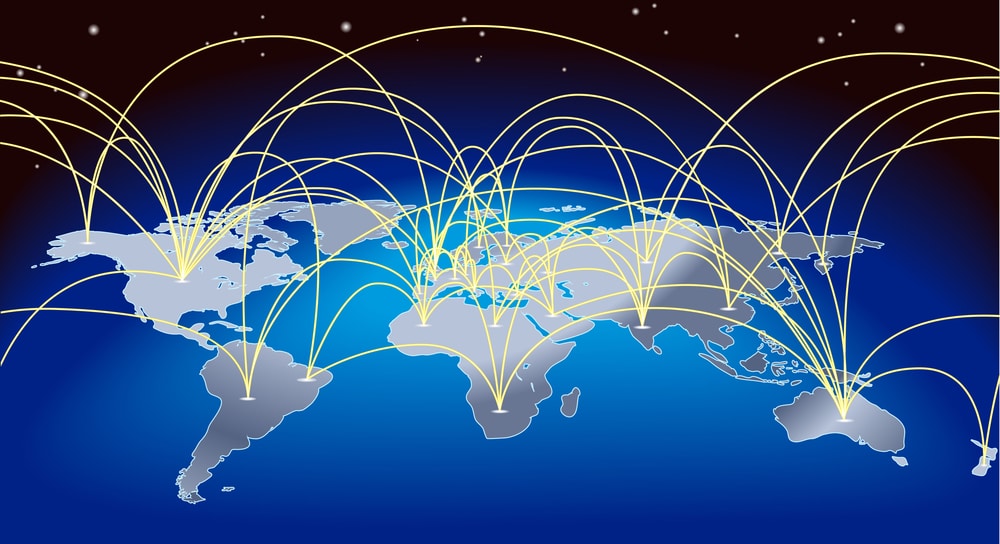 A world map background with flight paths or trade routes